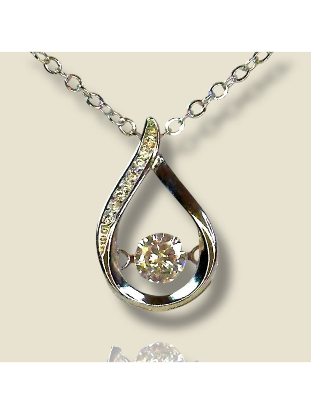 Sterling Silver Teardrop Pendant Necklace With Sparkling Dancing Cubic Zirconia